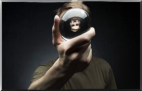 man-with-a-crystal-ball-in-hand