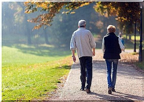 elderly couple walking