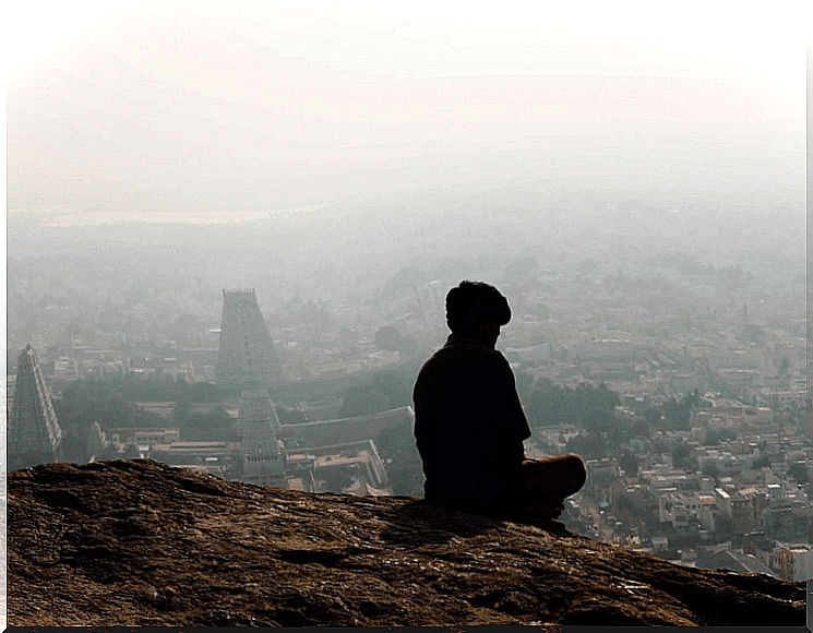 man looking at the city