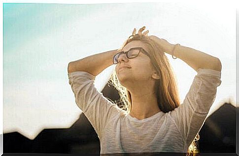 A woman feeling happiness