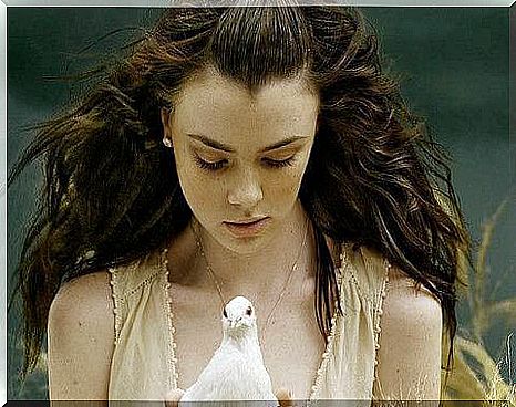 Girl-with-dove-in-hands