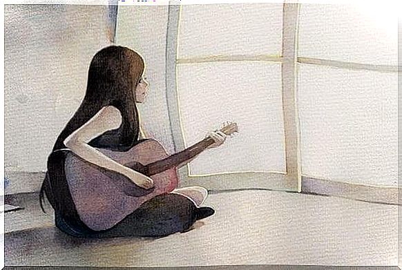 Woman-and-guitar-on-the-floor