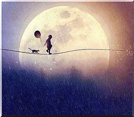 Child-walking-with-a-cat-and-a-balloon-near-the-moon